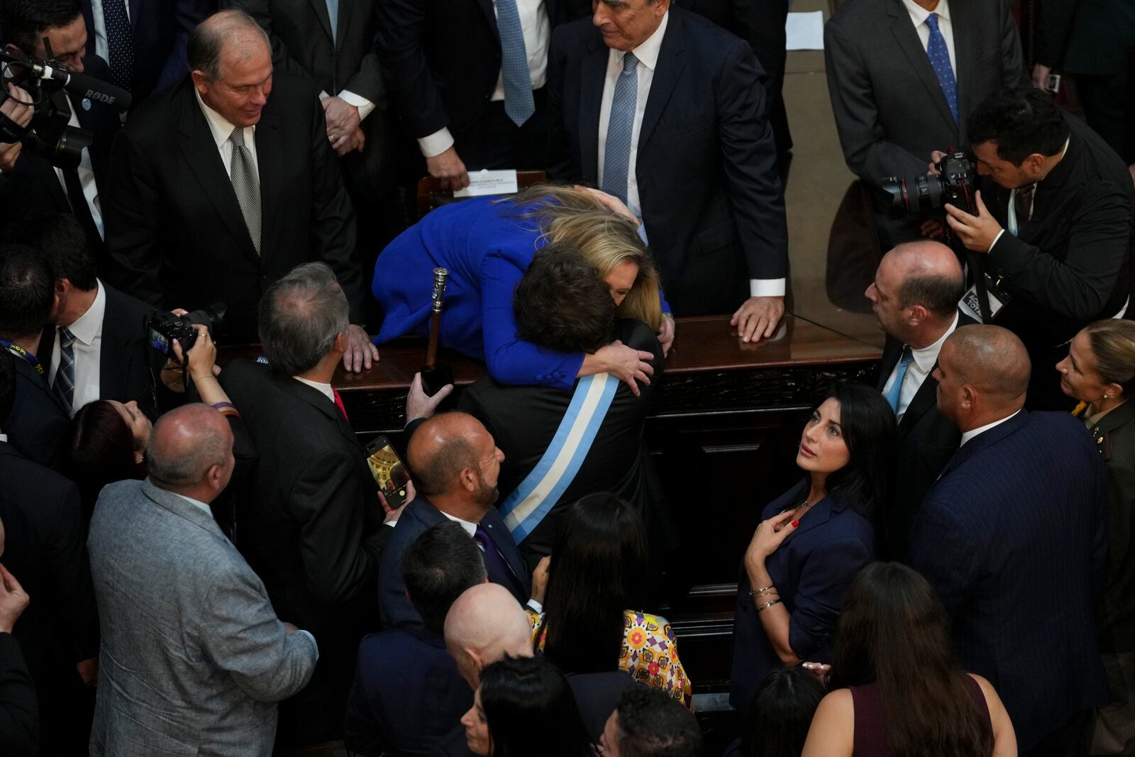 Argentina's President Javier Milei embraces his sister, Karina Milei, after delivering the annual State of the Nation address, which marks the start of the legislative year, in Buenos Aires, Argentina, Saturday, March 1, 2025. (AP Photo/Rodrigo Abd)