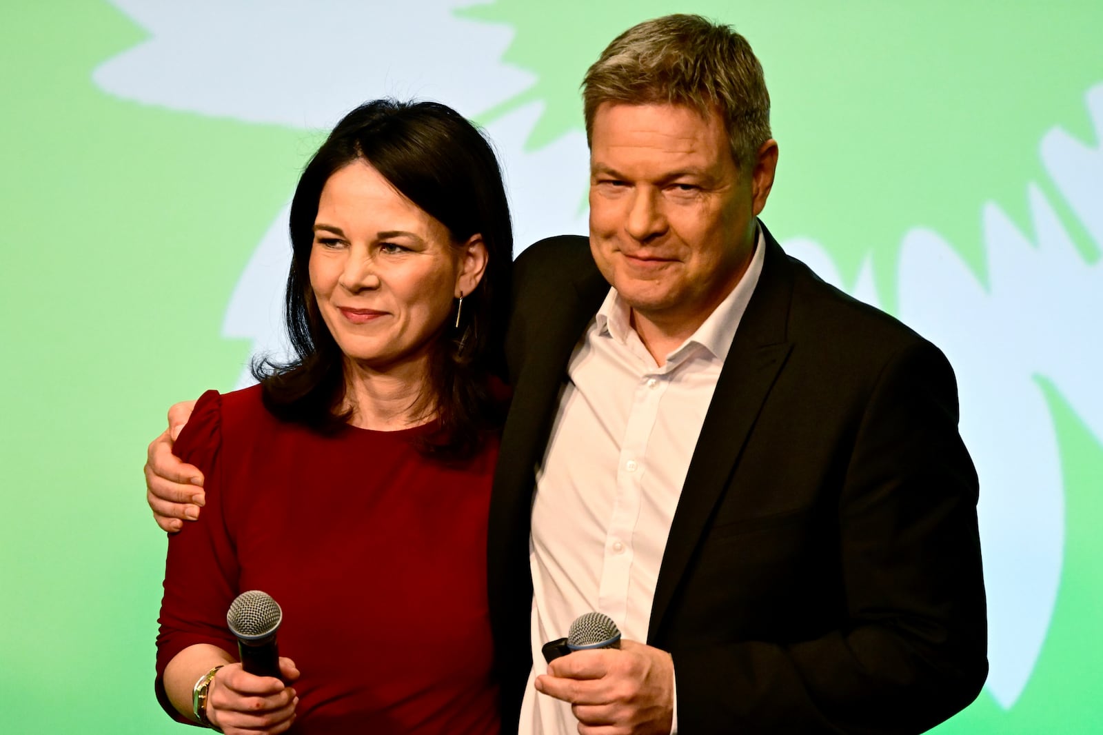 German Foreign Minister Annalena Baerbock, left, and the top candidate Robert Habeck attend the election party of the Greens (Buendnis 90/Die Gruenen) in Berlin Germany, Sunday, Feb. 23, 2025.(Fabian Sommer/dpa via AP)