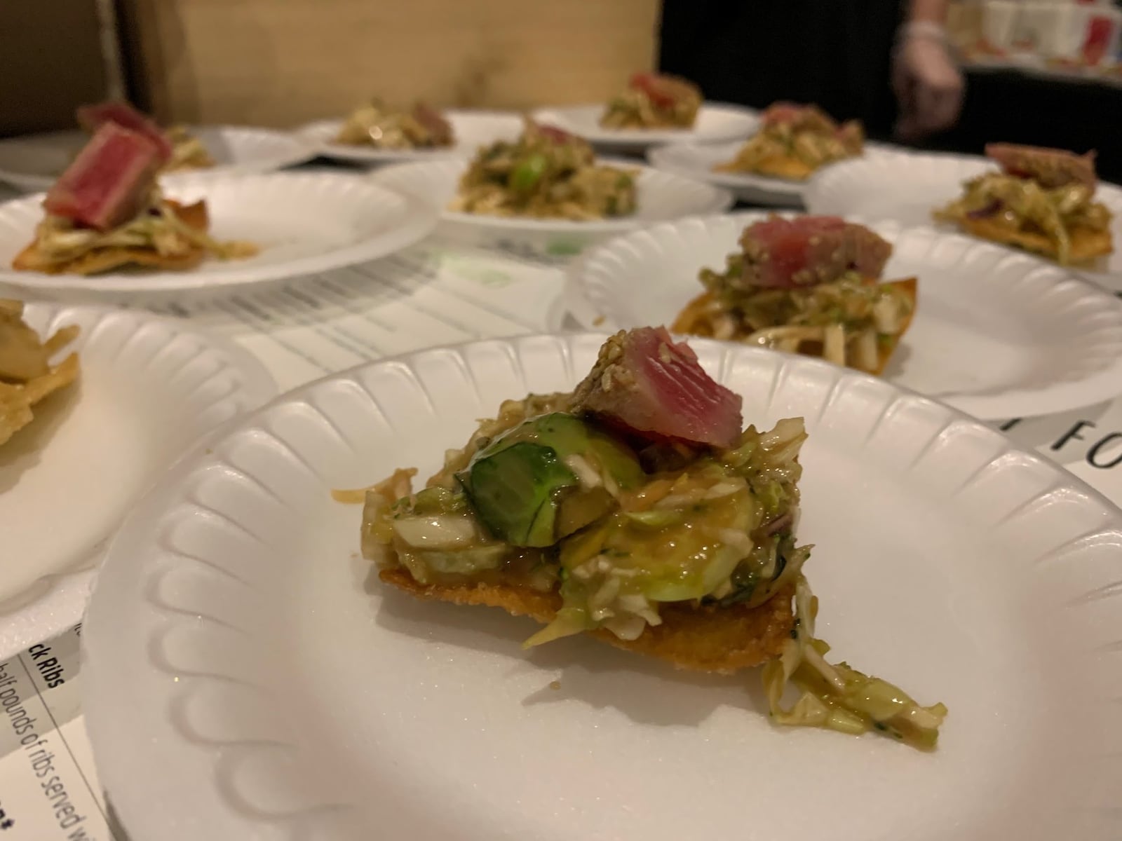 Beautiful cuts of sesame crusted seared ahi tuna served on top of a fried wonton on a bed of sautéed vegetables drizzled with Asian dressing was the dish from Basil’s on Market at the Miami Valley Restaurant Association’s Sneak Peek to Winter Restaurant Week in 2020. CONTRIBUTED/ALEXIS LARSEN