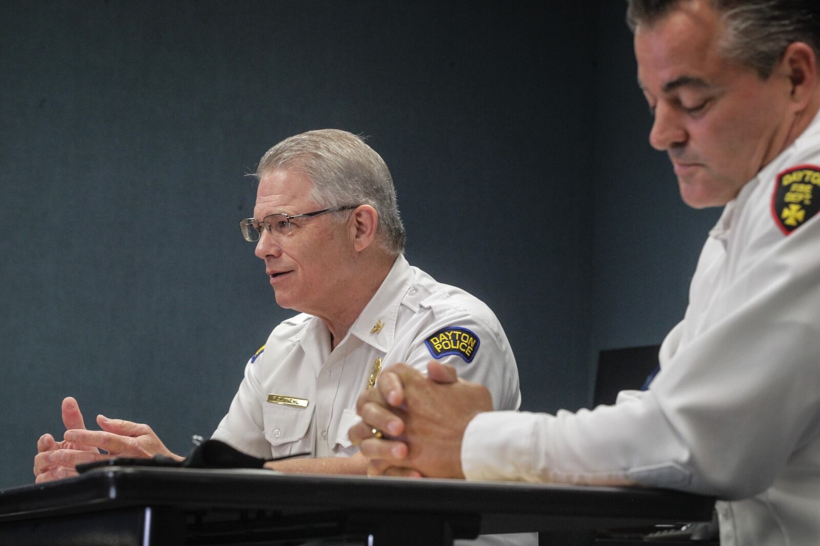 Reflecting on the one-year anniversary of the Oregon District shooting, Dayton Police Chief Richard Biehl, left and City of Dayton Fire Chief Jeff Lykins. JIM NOELKER/STAFF