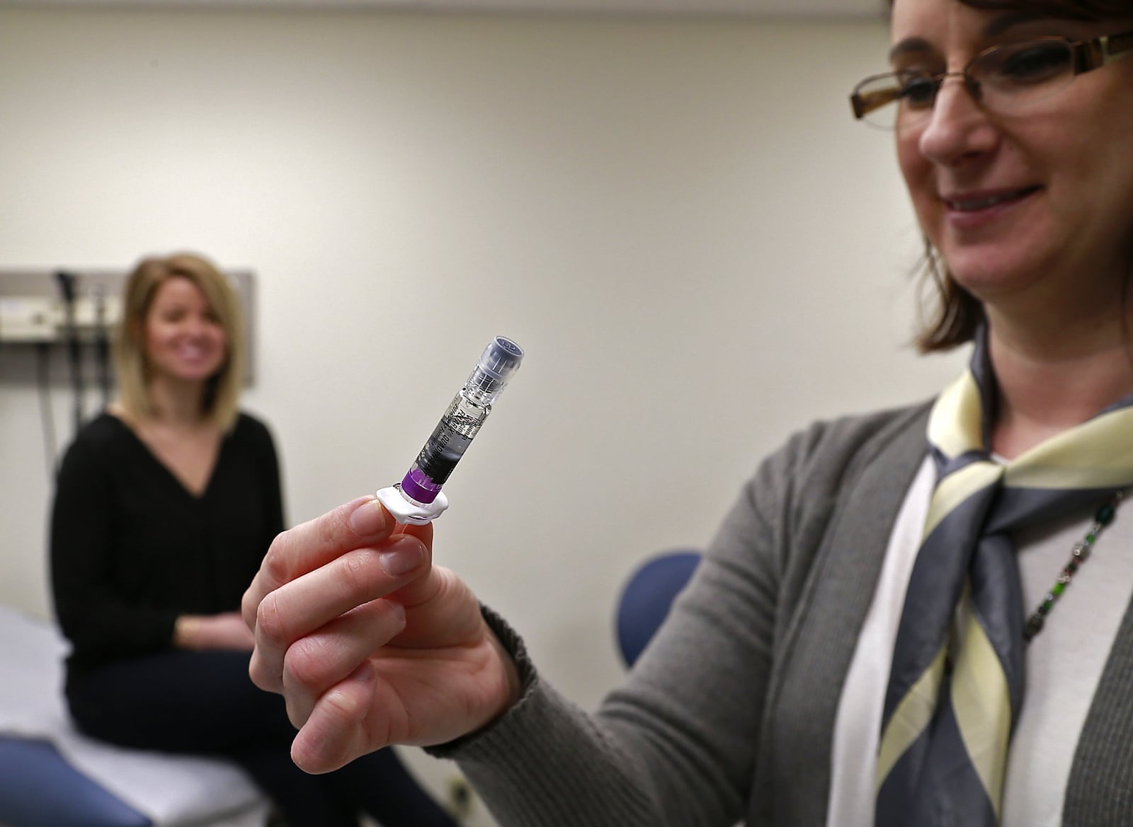 File - Pictured is Kristen Earley, an RN at the Clark County Combined Heath District, with a preloaded flu shot ready in February 2017. Clark County, like much of the state, is continuing to see a high level of flu activity as of Feb. 14, 2025. Flu hospitalizations have exceeded the five-year average for this time of year, jumping more than 300%. BILL LACKEY/STAFF FILE