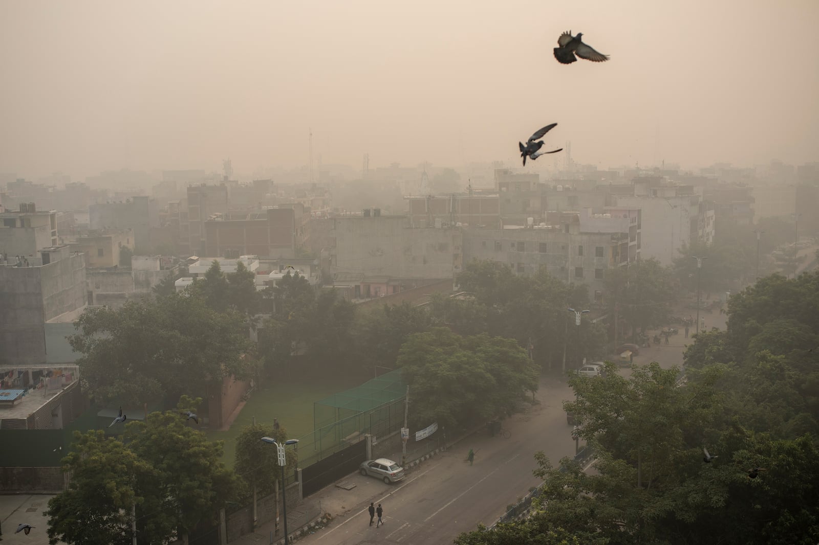 FILE- Morning haze envelops the skyline the day after tens of thousands of people set off massive firecrackers to celebrate the Hindu festival of Diwali in New Delhi, India, Nov. 5, 2021. (AP Photo/Altaf Qadri, File)