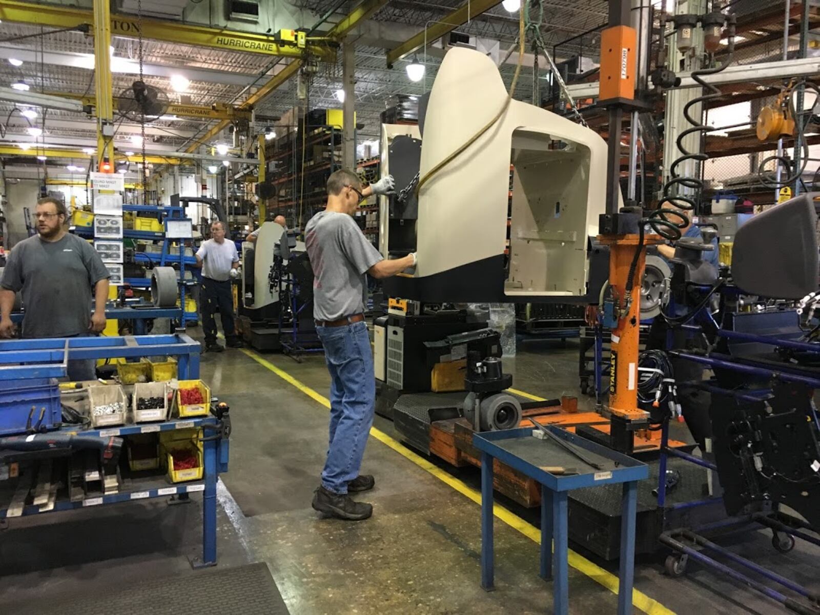 A worker at one of Crown Equipment's New Bremen, Ohio manufacturing floors. THOMAS GNAU/STAFF