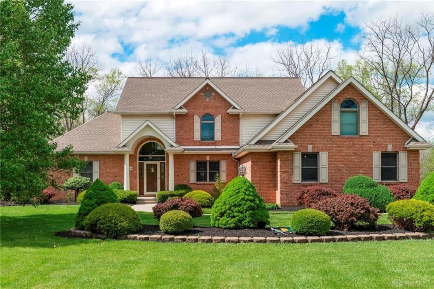 PHOTOS: Nearly 10-acre Miami County property listed has luxury home, stocked fishing pond