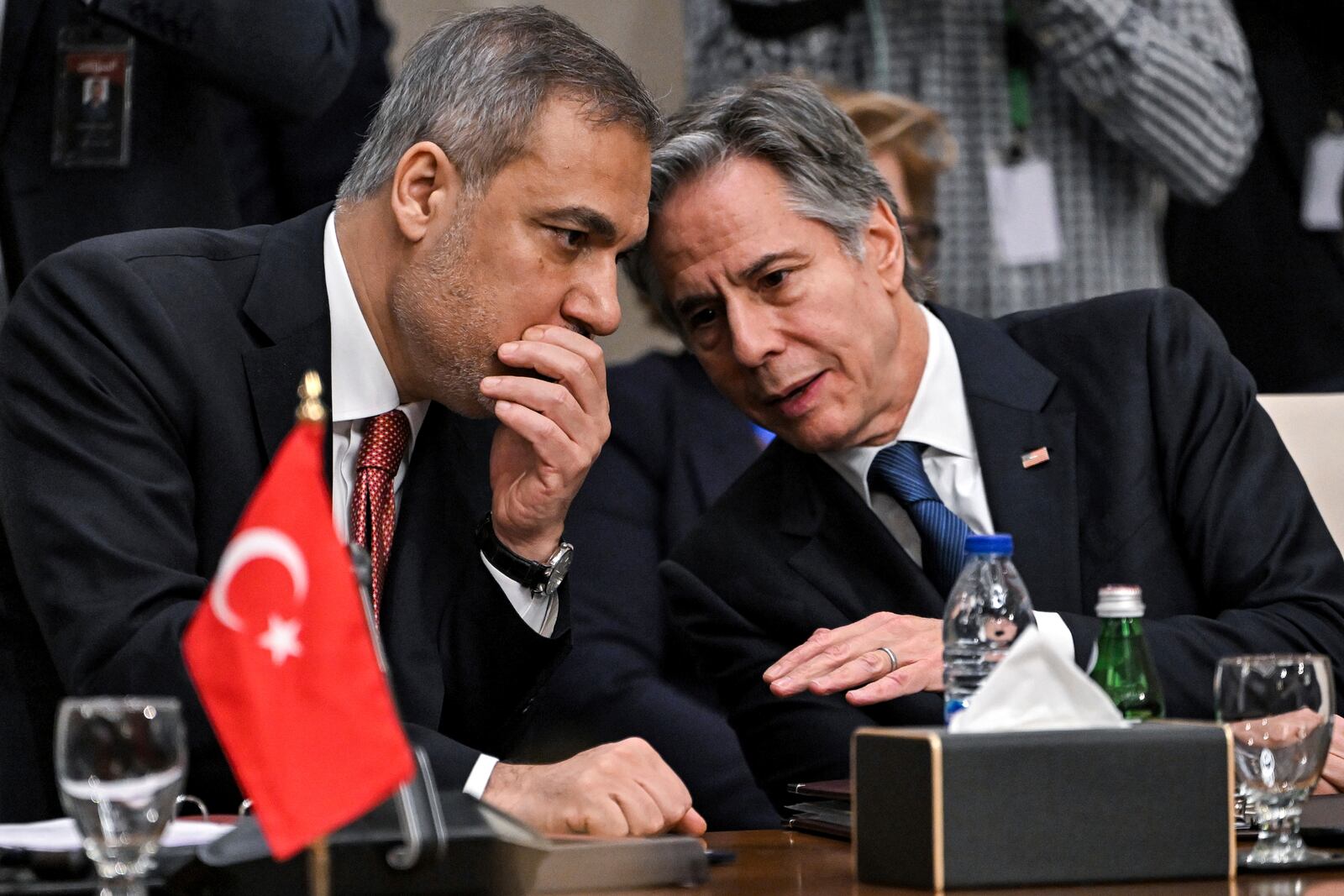 Turkey's Foreign Minister Hakan Fidan, left, speaks with US Secretary of State Antony Blinken during a meeting with the foreign ministers of the Arab Contact Group on Syria in Jordan's southern Red Sea coastal city of Aqaba, Saturday Dec. 14, 2024. (Andrew Caballero-Reynolds/Pool via AP)