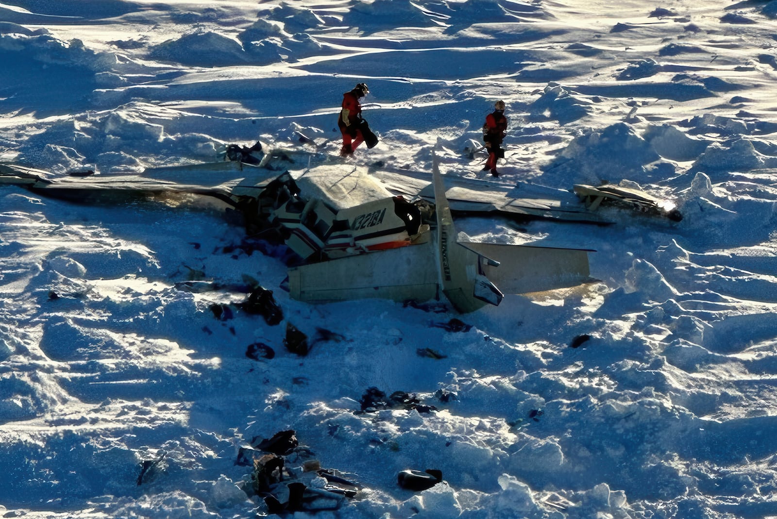 FILE - This photo provided by the U.S. Coast Guard on Feb. 7, 2025, shows a small commuter plane that crashed in western Alaska on a flight that was bound for the hub community of Nome. (U.S. Coast Guard via AP, File)