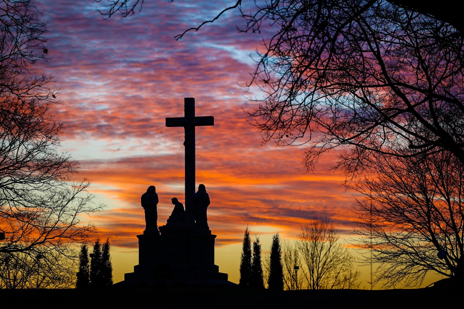 Calvary Cemetery held "Angel Night" Thursday evening December 1, 2022. Dozens of headstones depicting angels were lit as the cemetery treating visitors with tours, music and a food drive for St. Vincent De Paul. JIM NOELKER/STAFF