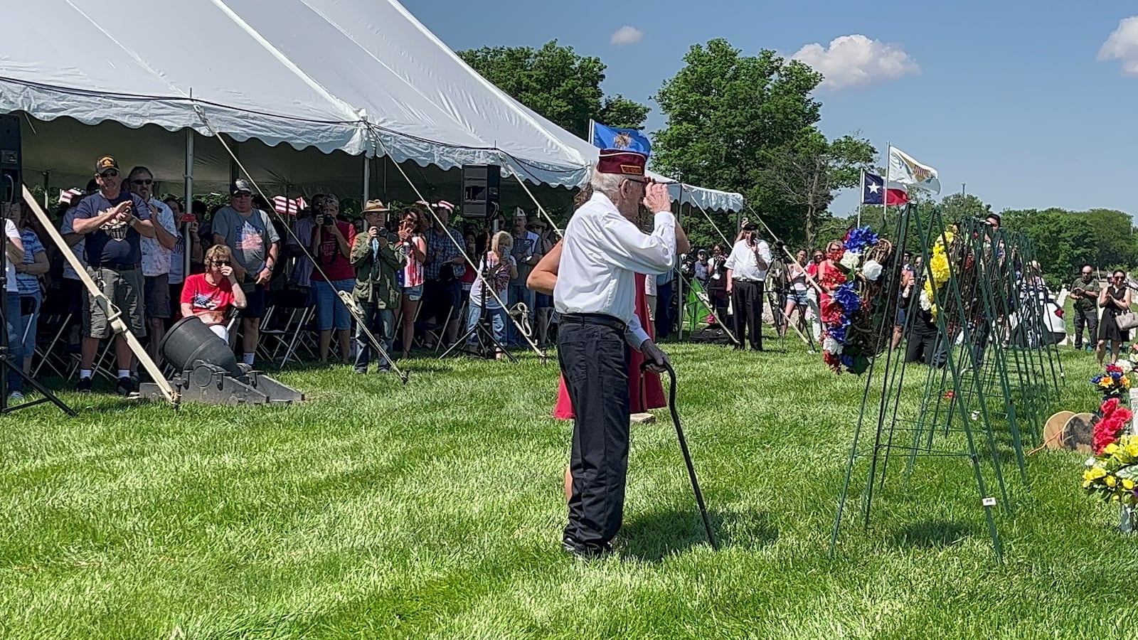 World War II prisoner of war Albert Brown lays a wreath at the Dayton National Cemetery's 2022 Memorial Day ceremony. ZOE KALEN HILL / STAFF