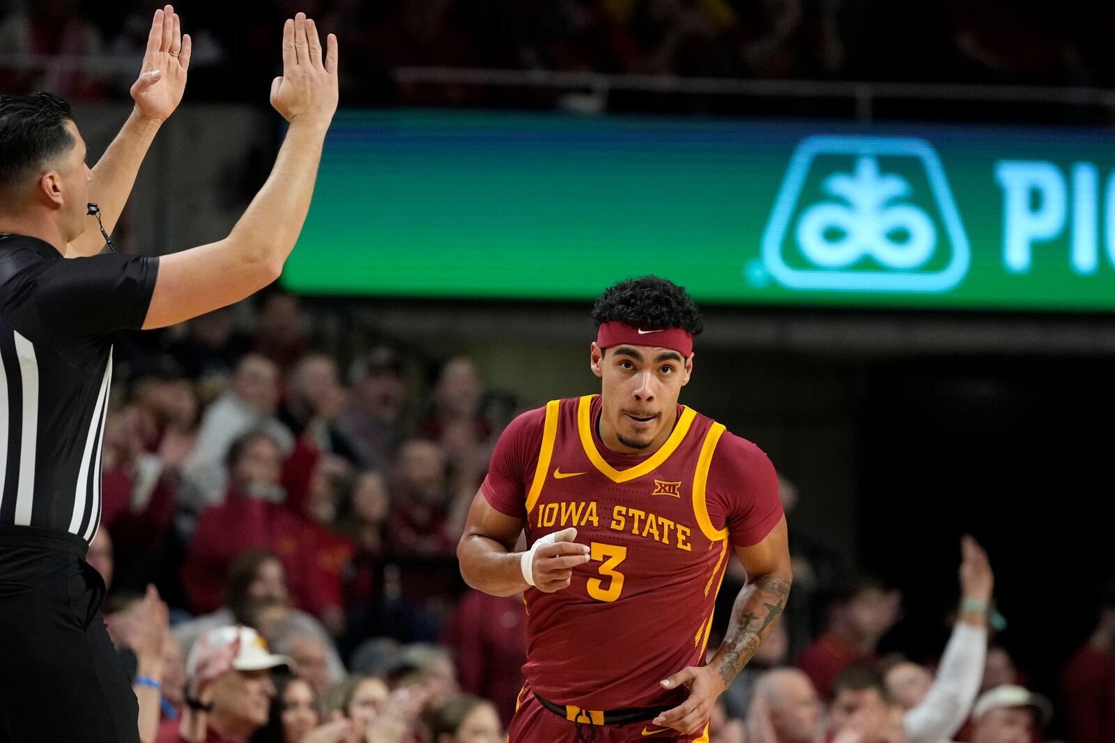 Iowa State guard Tamin Lipsey celebrates after making a three-point basket during the first half of an NCAA college basketball game against Cincinnati Saturday, Feb. 15, 2025, in Ames, Iowa. (AP Photo/Charlie Neibergall)