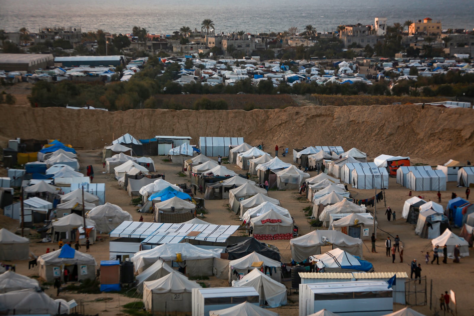 A view of a tent camp for displaced Palestinians in Khan Younis, Gaza Strip, Saturday, Jan. 18, 2025. (AP Photo/Jehad Alshrafi)