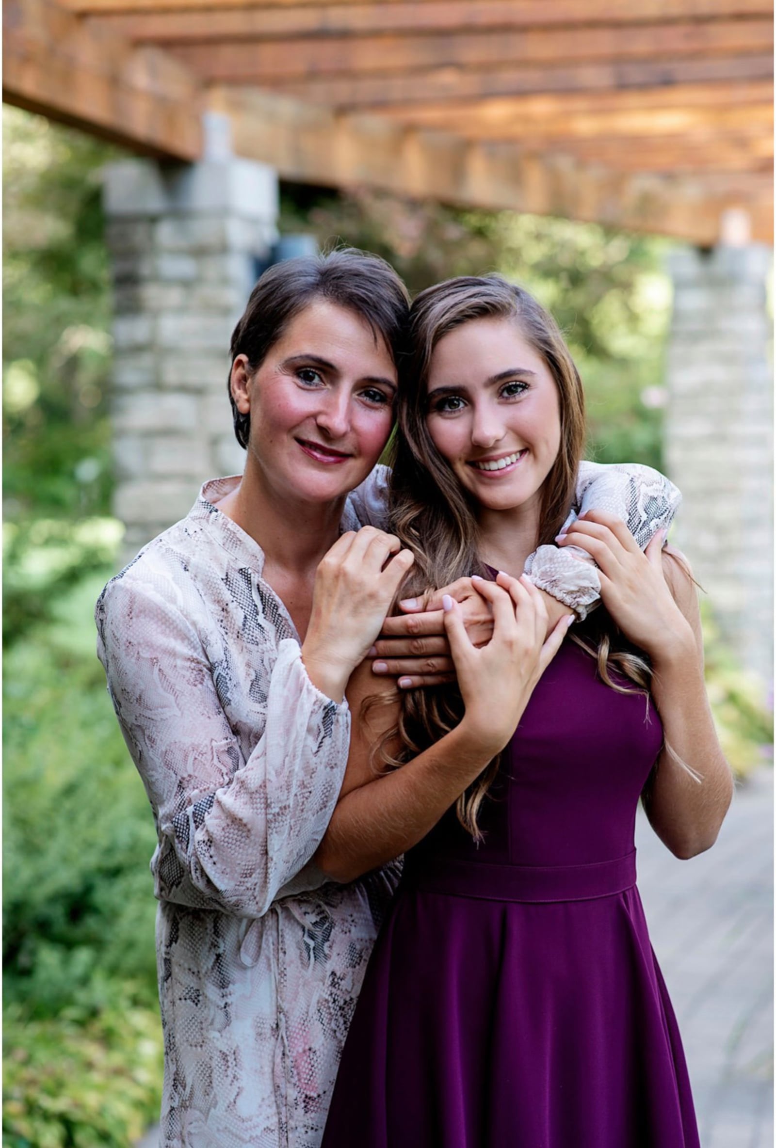 Narcisa Mikov (L) with her daughter Nicole, now a college student. Nicole joined her mother on several mission trips to distribute water filters to needy countries.