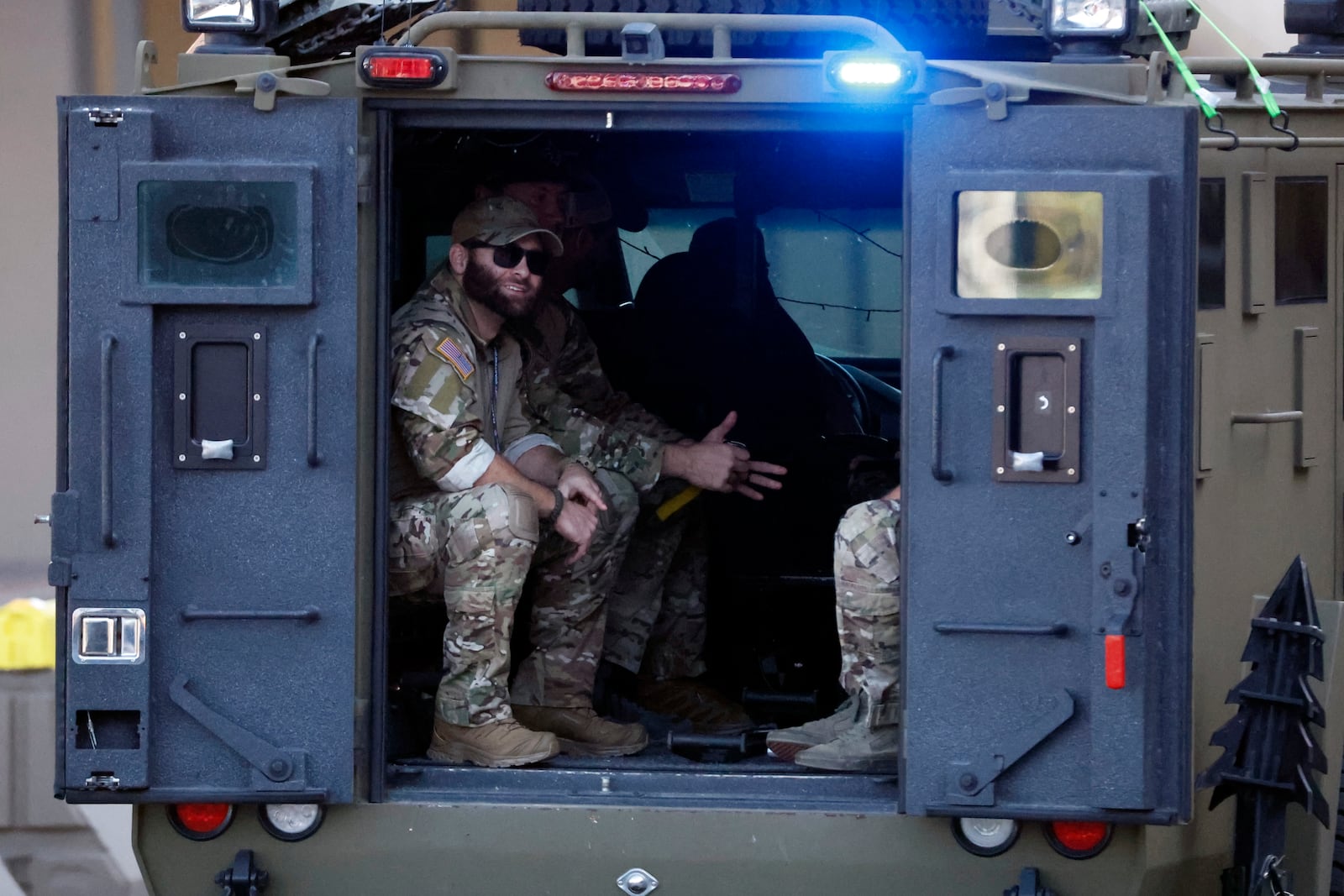 Local SWAT teams patrol outside the Caesars Superdome ahead of the Sugar Bowl NCAA College Football Playoff game, Thursday, Jan. 2, 2025, in New Orleans. (AP Photo/Butch Dill)