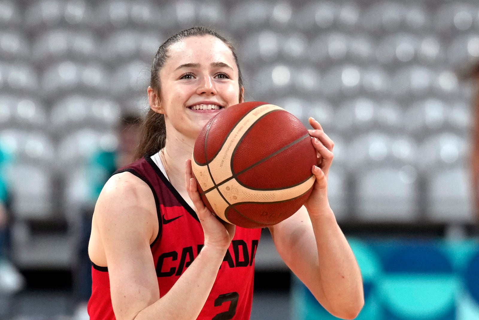 FILE - Canada's Syla Swords shoots during women's basketball practice at the 2024 Summer Olympics, July 25, 2024, in Villeneuve-d'Ascq, France. (AP Photo/Mark J. Terrill, File)