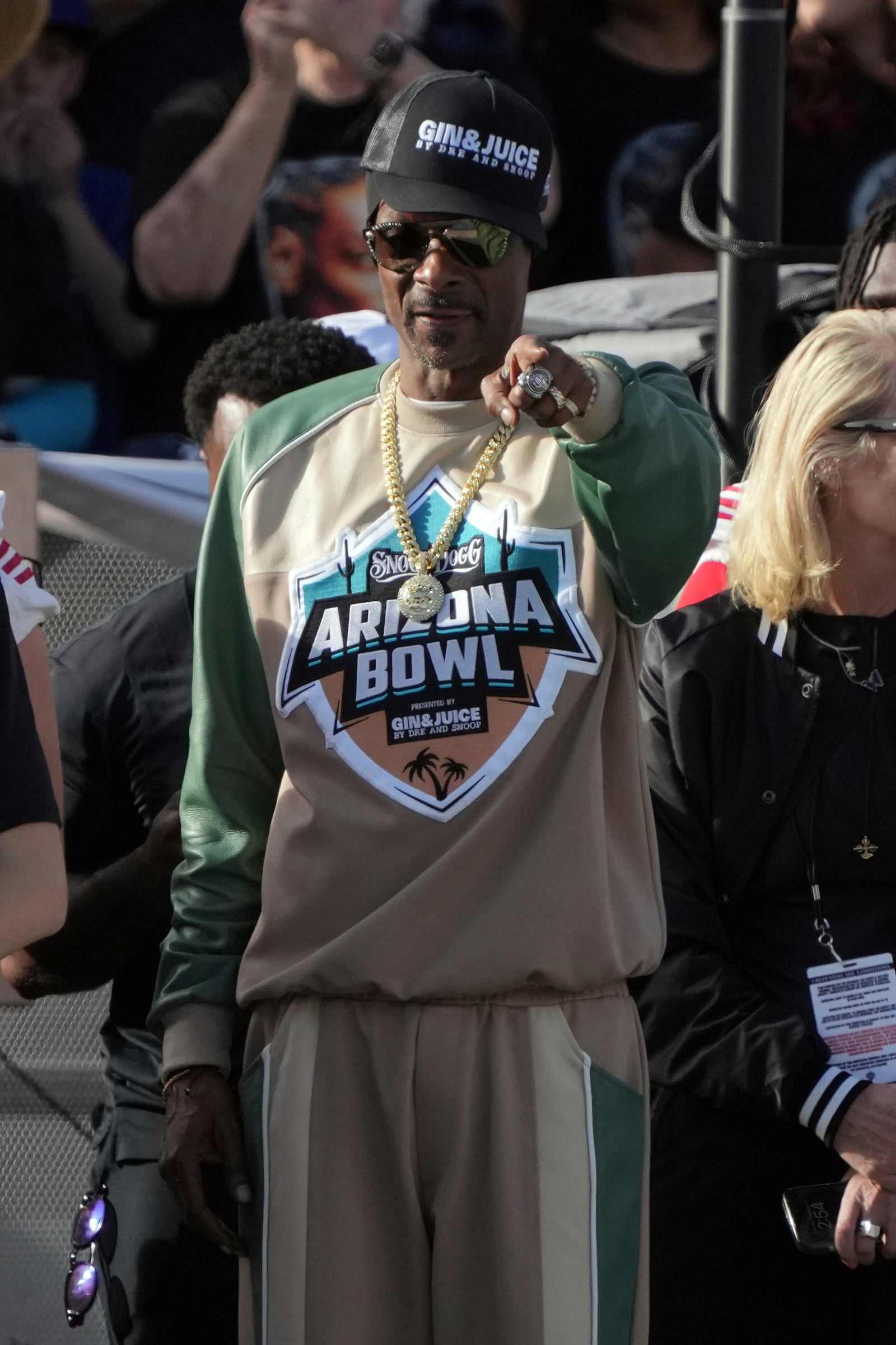 Snoop Dogg reacts after a play between Colorado State and Miami (Ohio) in the first half of the Arizona Bowl NCAA college football game, Saturday, Dec. 28, 2024, in Tucson, Ariz.