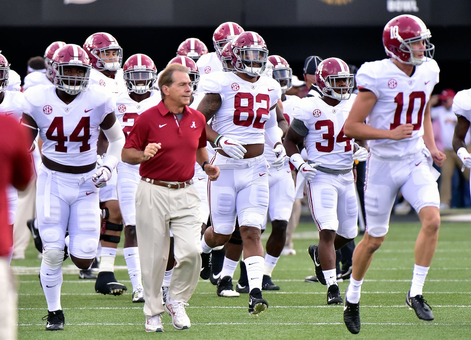 NASHVILLE, TN - SEPTEMBER 23: Head coach Nick Saban of the Alabama Crimson Tide runs onto the field with his team prior to a game against the Vanderbilt Commodores during the first half at Vanderbilt Stadium on September 23, 2017 in Nashville, Tennessee. (Photo by Frederick Breedon/Getty Images)