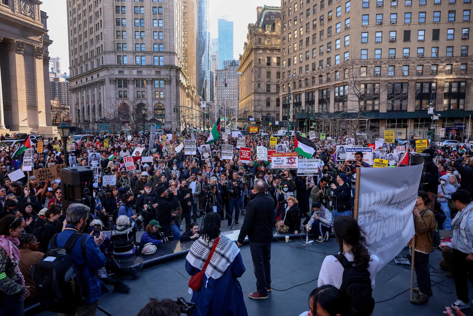 Protestors demonstrate and demand the release of Palestinian activist Mahmoud Khalil, Monday, March 10, 2025, outside the Jacob K. Javits Federal Building in New York. (AP Photo/Yuki Iwamura)