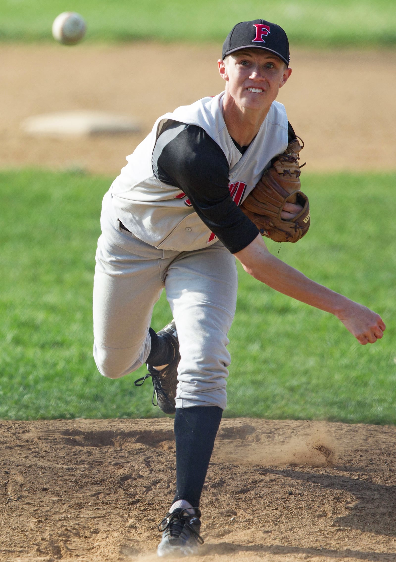 Franklin pitcher Travis Lakins delivers to the plate during a Southwestern Buckeye League baseball game April 15, 2013, at Oakwood. COX MEDIA FILE PHOTO