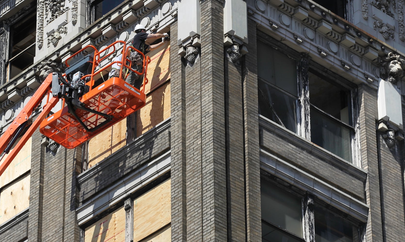 Arcade windows being boarded up