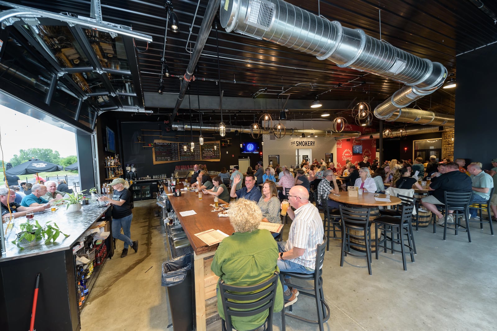 The new Warped Wing Brewery & Smokery, located at 6602 Executive Boulevard in Huber Heights next to the Rose Music Center at The Heights, celebrated its grand opening on Friday, June 16, 2023. Did we spot you there? TOM GILLIAM / CONTRIBUTING PHOTOGRAPHER