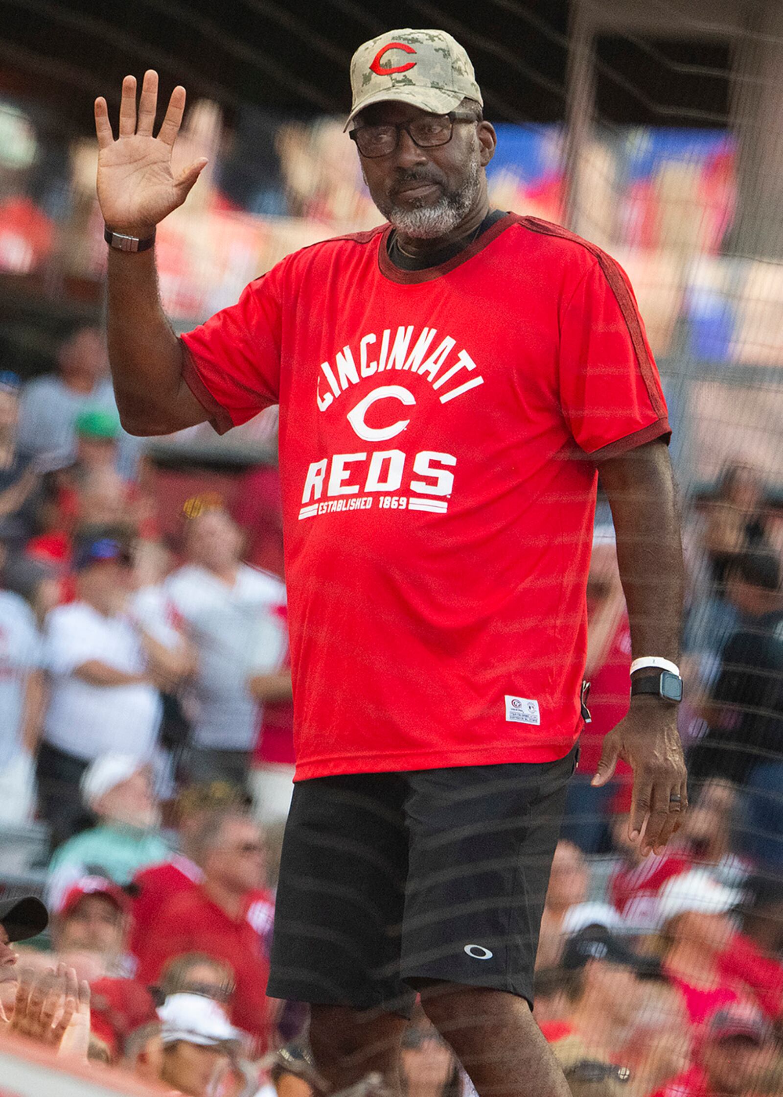 Mark Lyle, 88th Air Base Wing legislative liaison, acknowledges the crowd from atop the Reds’ dugout after being announced as the game’s hometown hero Sept. 2 at Great American Ball Park in Cincinnati. U.S. AIR FORCE PHOTO/R.J. ORIEZ