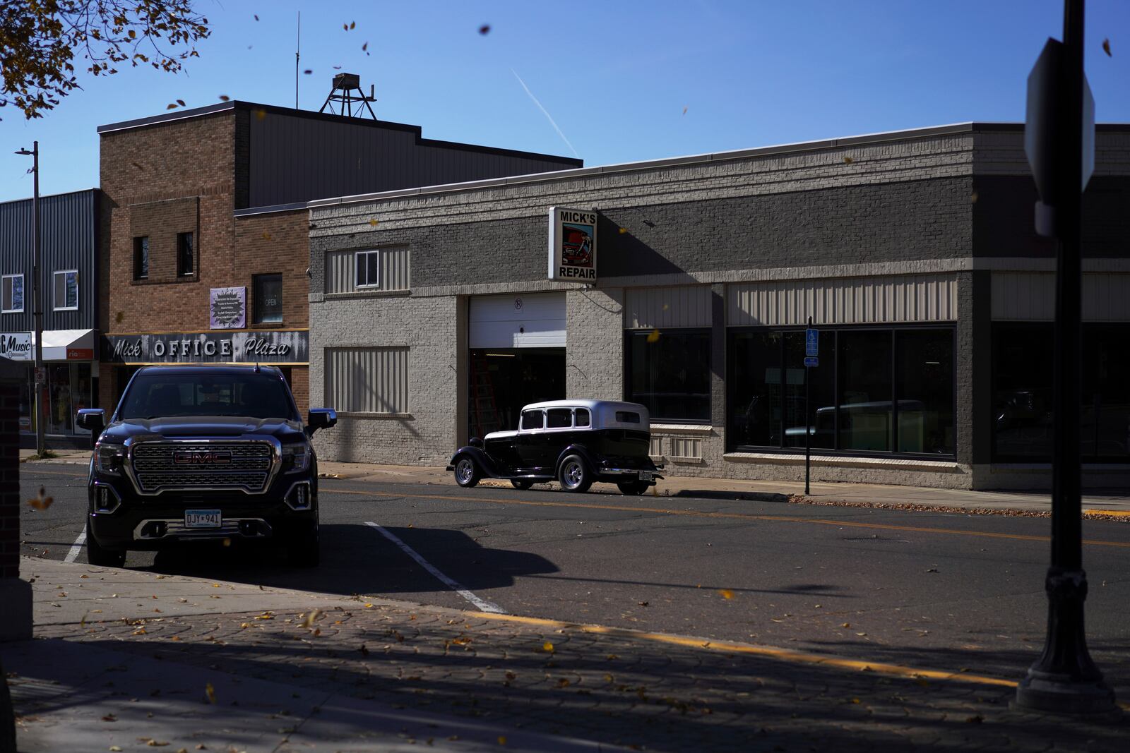 A classic car sits in front of Mick’s Repair in Worthington, Minn., on Tuesday, Oct. 22, 2024. (AP Photo/Jessie Wardarski)