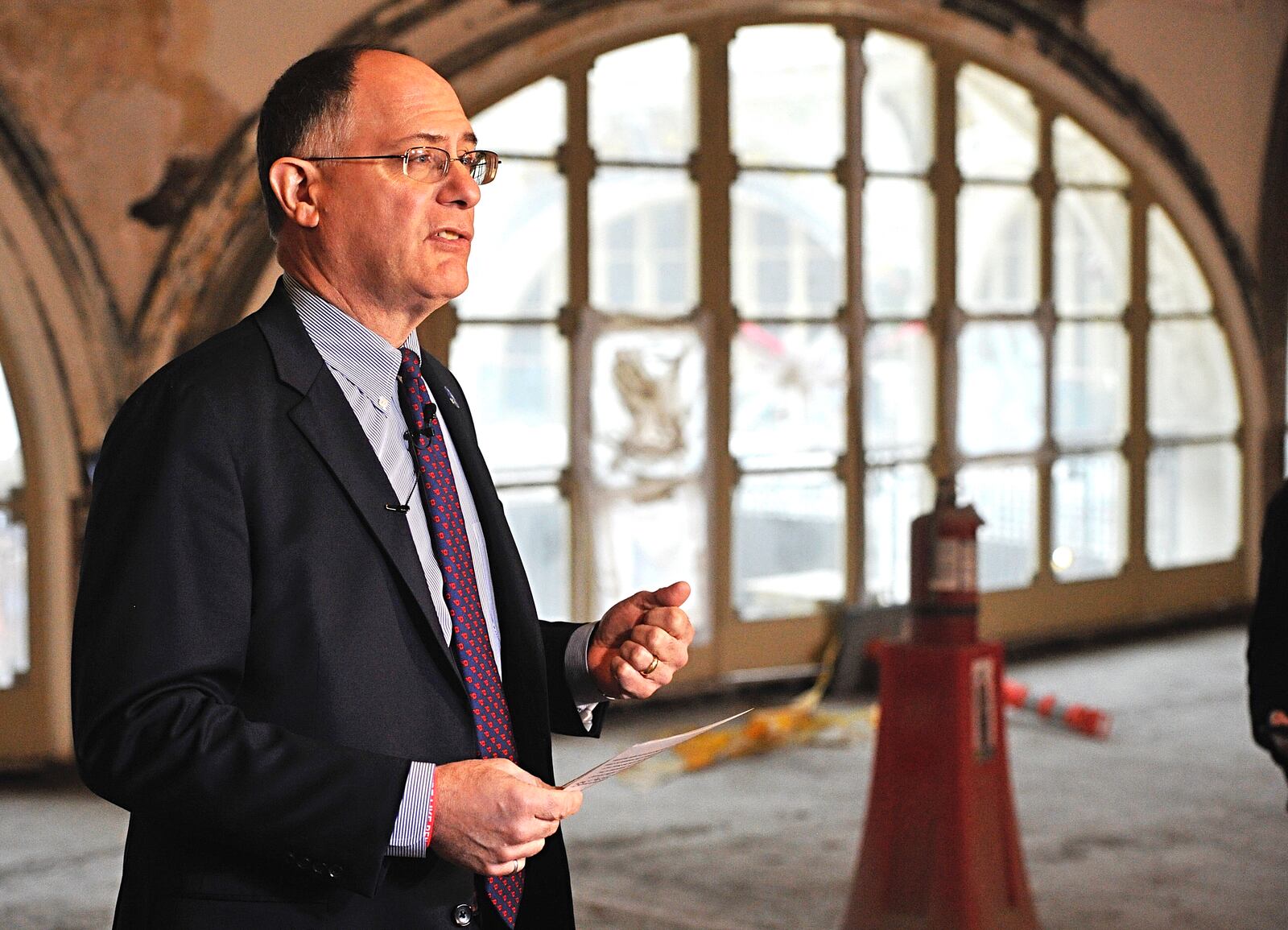 Eric Spina, University of Dayton president, talking about the university's and the Entrepreneurship Center's partnership with PNC Bank at the Dayton Arcade Hub last month. MARSHALL GORBY/STAFF