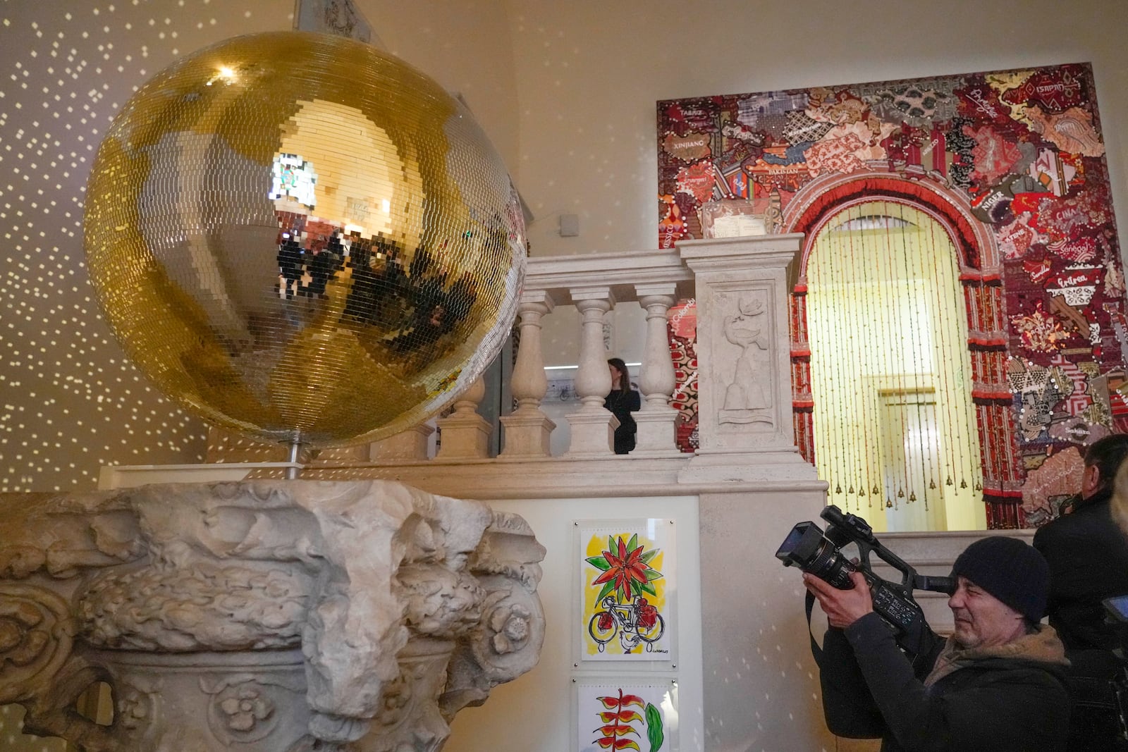 Art installations are displayed during the preview of the exhibition "En Route" organized by the Vatican Apostolic Library exploring world tours of the late 19th century at the Vatican, Friday, Jan. 31, 2025. (AP Photo/Gregorio Borgia)