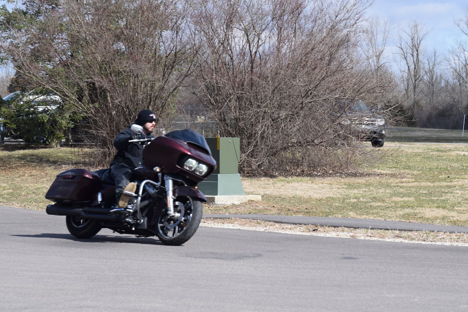 PHOTOS: Thousands of Outlaws attend motorcycle gang leaders funeral at Montgomery County Fairgrounds.