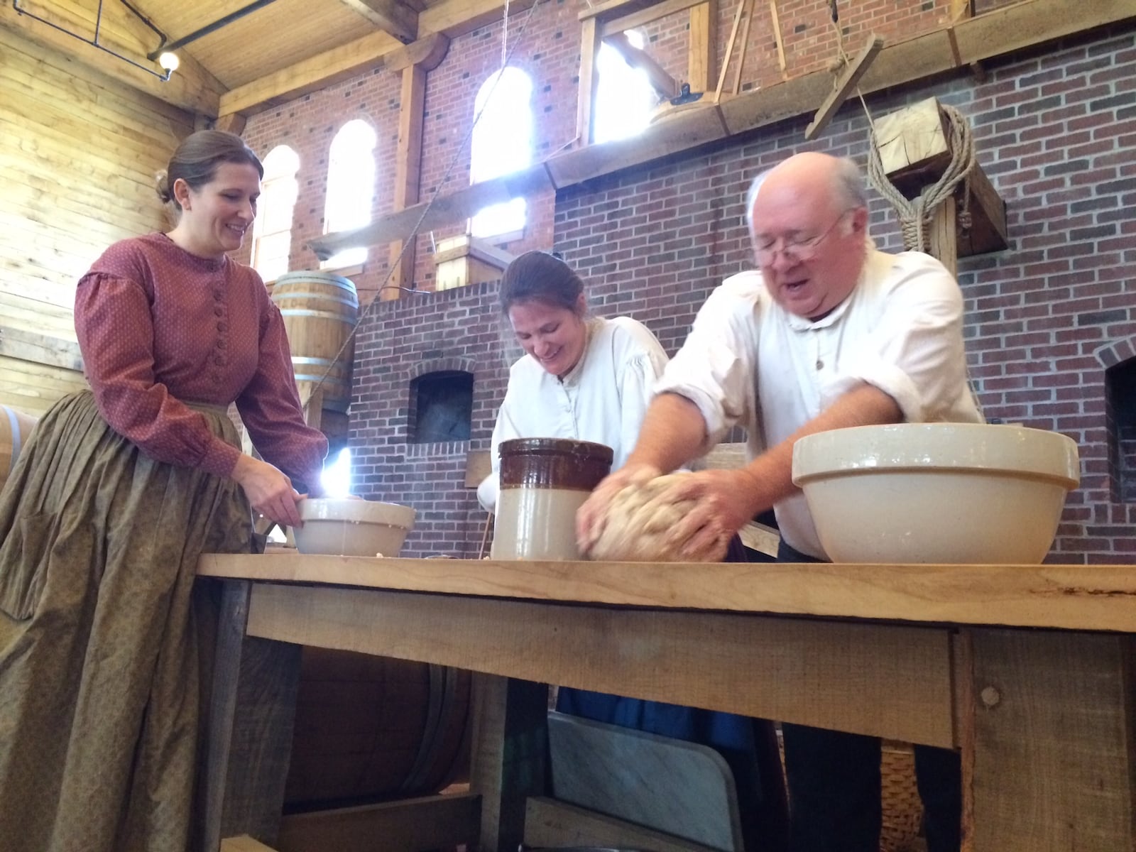 Carillon Brewing Company’s Tanya Brock with employees creating Irish soda bread.