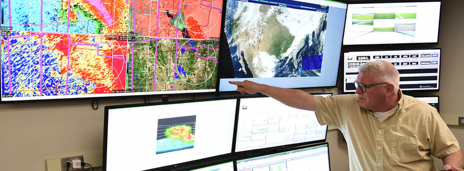 Philip Studler, 88th Operations Support Squadron weather forecaster, recalls the Memorial Day 2019 tornado at Wright-Patterson Air Force Base. He was on duty in the base weather station that night and issued a tornado warning for the Prairies military housing area 16 minutes prior to touchdown. U.S. AIR FORCE PHOTO/MATTHEW CLOUSE