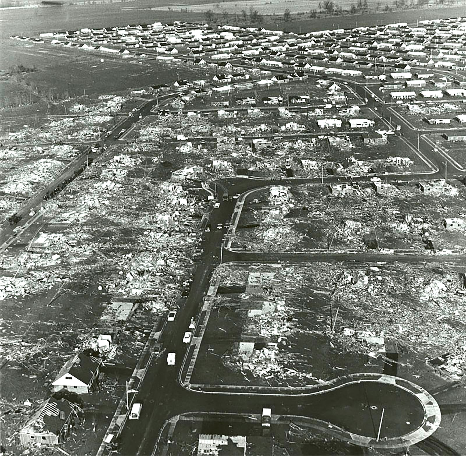 On April 3, 1974 an F-5 tornado tore through the heart of Xenia, killing 33 people and injuring more than 1,300 others. It bulldozed a path more than a half-mile wide, destroying or damaging more than 1,400 buildings, including 1,200 homes, dozens of businesses, 10 churches, and several schools. By the time it lifted into the sky near Cedarville, it left behind more than $100 million of damage in Greene County. DAYTON DAILY NEWS ARCHIVE