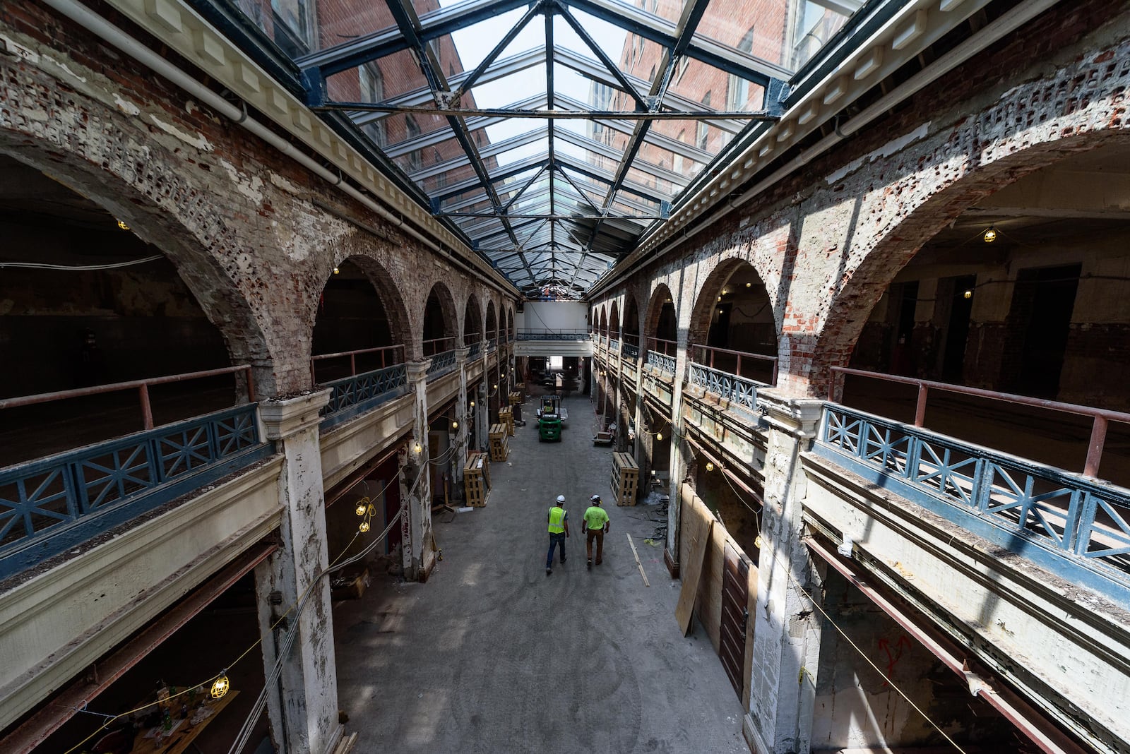 Here’s a look at construction progress of the Dayton Arcade’s North Arcade. Recent updates include a new roof, skylight glass and elevator shaft. The Dayton Arcade’s full development plan of nine buildings totaling over 500,000 SF will recast the Arcade in much the same way it was initially developed in the first decade of the 20th century—with a mix of retail, offices, event space and housing. The second phase, the North Arcade, will include a marketplace retail and restaurant environment as well a 94-room Hilton Garden Inn opening in 2024. TOM GILLIAM / CONTRIBUTING PHOTOGRAPHER