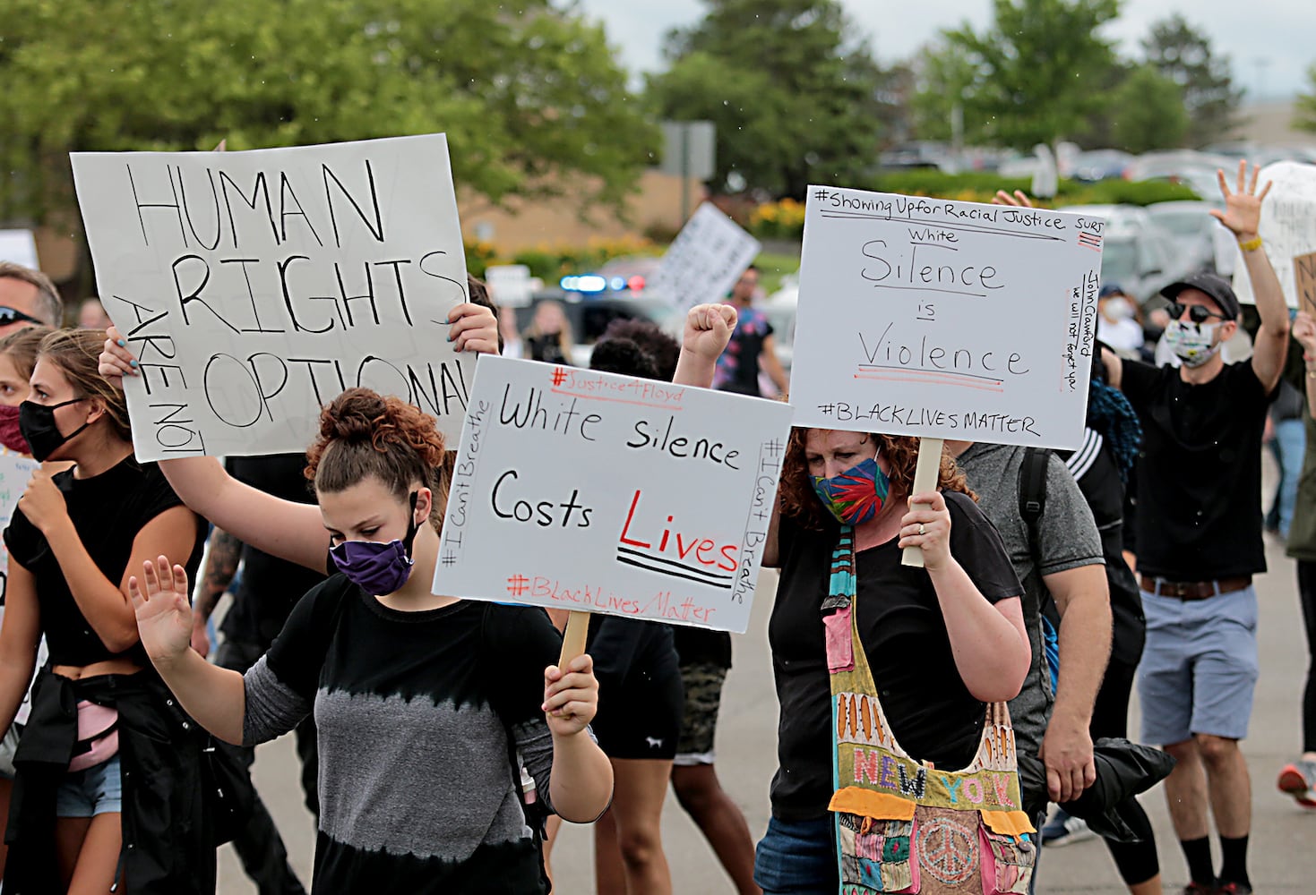 PHOTOS: Demonstrators rally for justice in Beavercreek