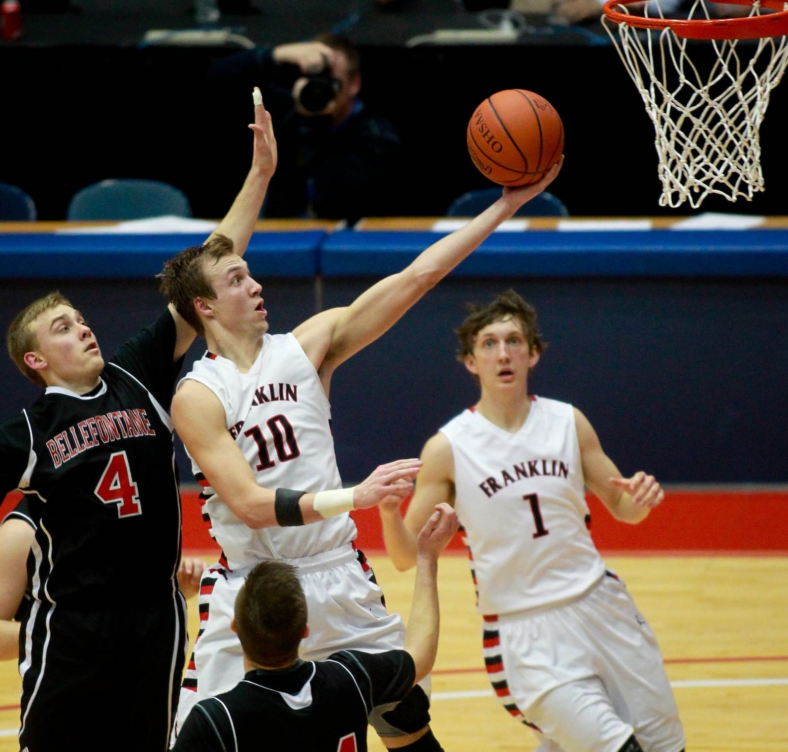 Franklin’s Luke Kennard scores past Bellefontaine’s Max Oyer during a Division II regional semifinal March 19, 2015, at the University of Dayton Arena. The Wildcats won 87-54. COX MEDIA FILE PHOTO