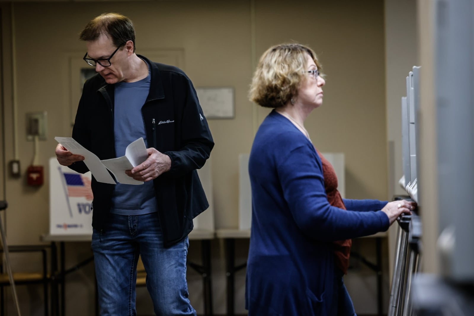 Larry Gache and Betty White  vote early at the Montgomery County Board of Elections Thursday March 14, 2024. JIM NOELKER/STAFF