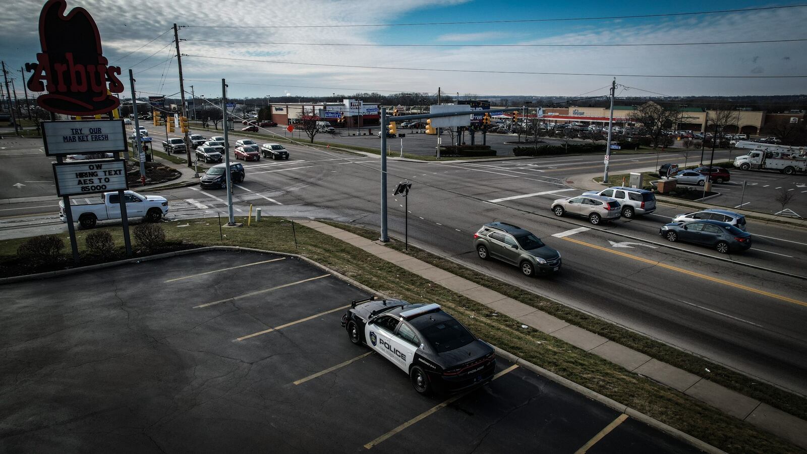 The Huber Heights intersection of Old Troy Pike and Merily Way near I70 is being monitored by Huber Heights police Thursday January 5, 2023. Residents have asked police to monitor the intersection in response to mounting concerns regarding motorist who are turning left onto Merily Way and blocking the intersection. JIM NOELKER/STAFF