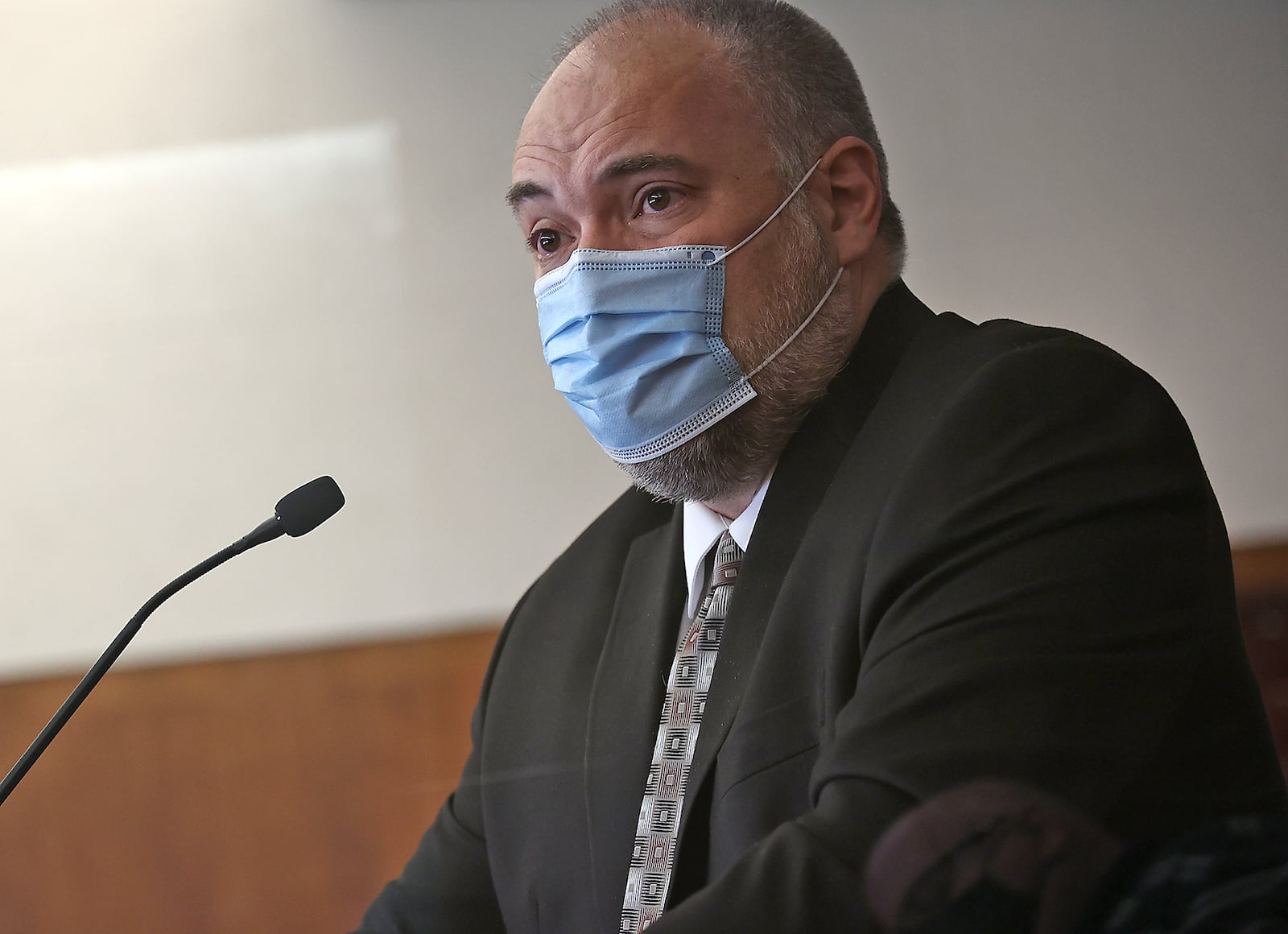 Charles Hostler, the father of murder victim Whitney Hostler, reads a tearful statement during the sentencing of Valerie Rider Thursday. BILL LACKEY/STAFF