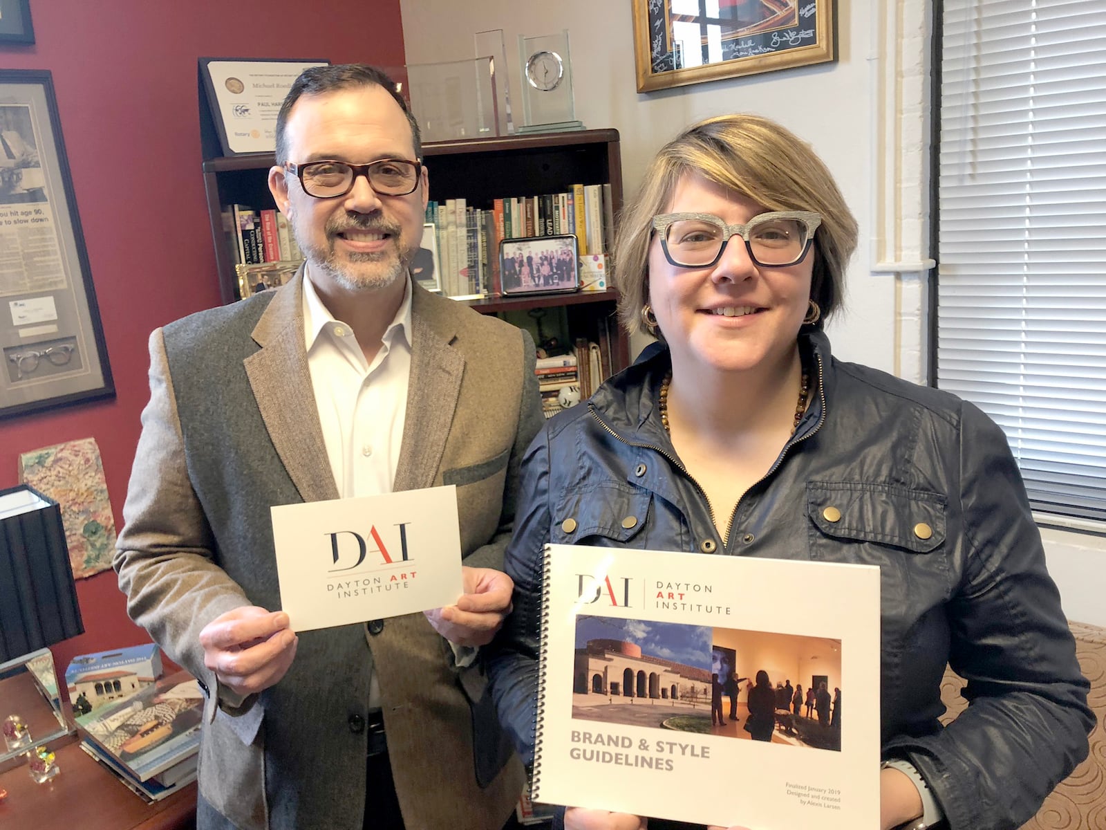 Dayton Art Institute CEO and President Michael Roediger and Alexis Larsen, its external affairs director, unveiled DAI’s new logo at the institution’s annual meeting Thursday, Feb. 28, 2019.