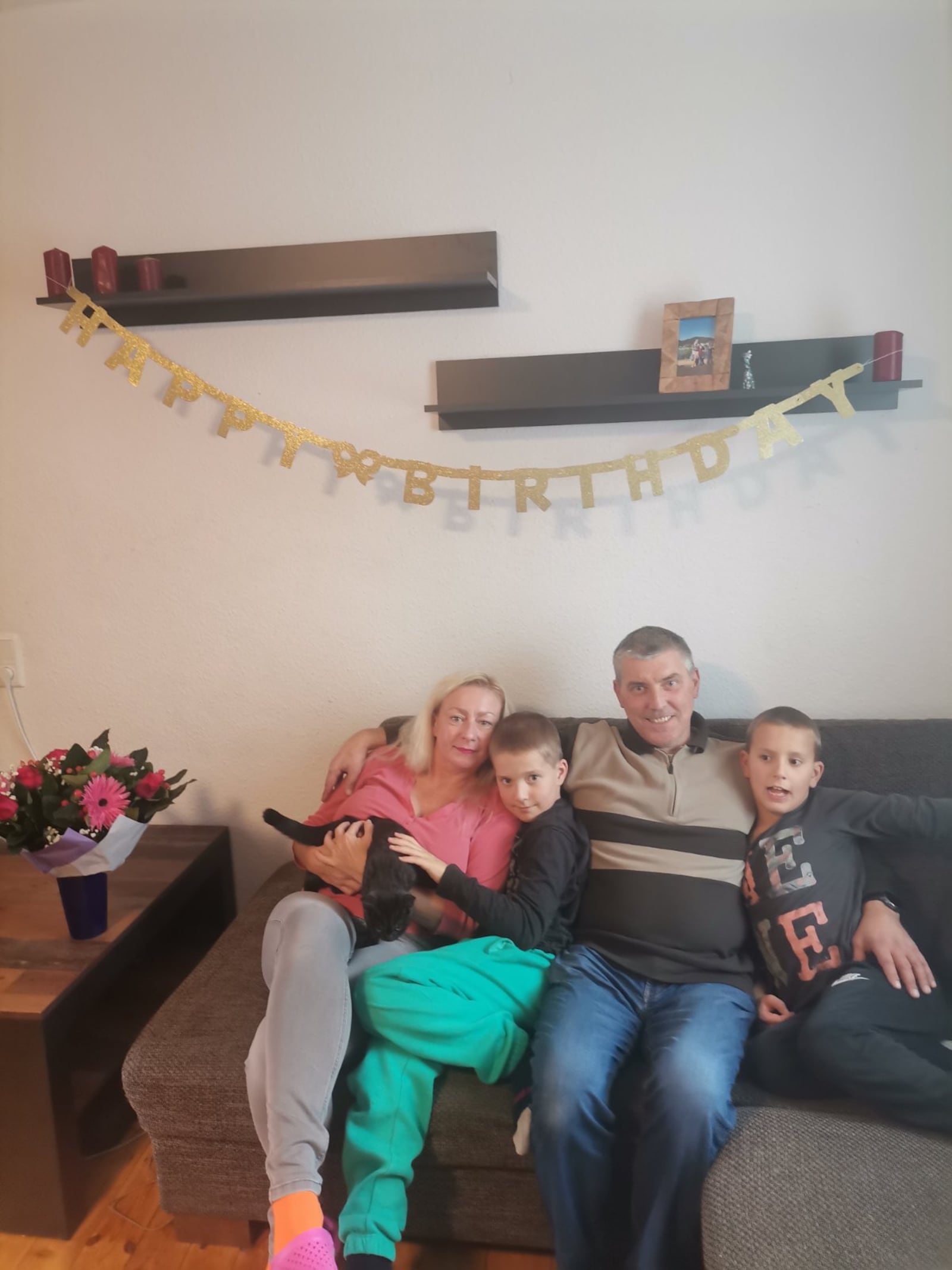 Lena, Andriy and their 9-year-old twins, Myron and Matvey. Andriy, Lena’s husband, was able to join them after fighting for two years and sustaining two injuries, the family is complete.  (CONTRIBUTED)