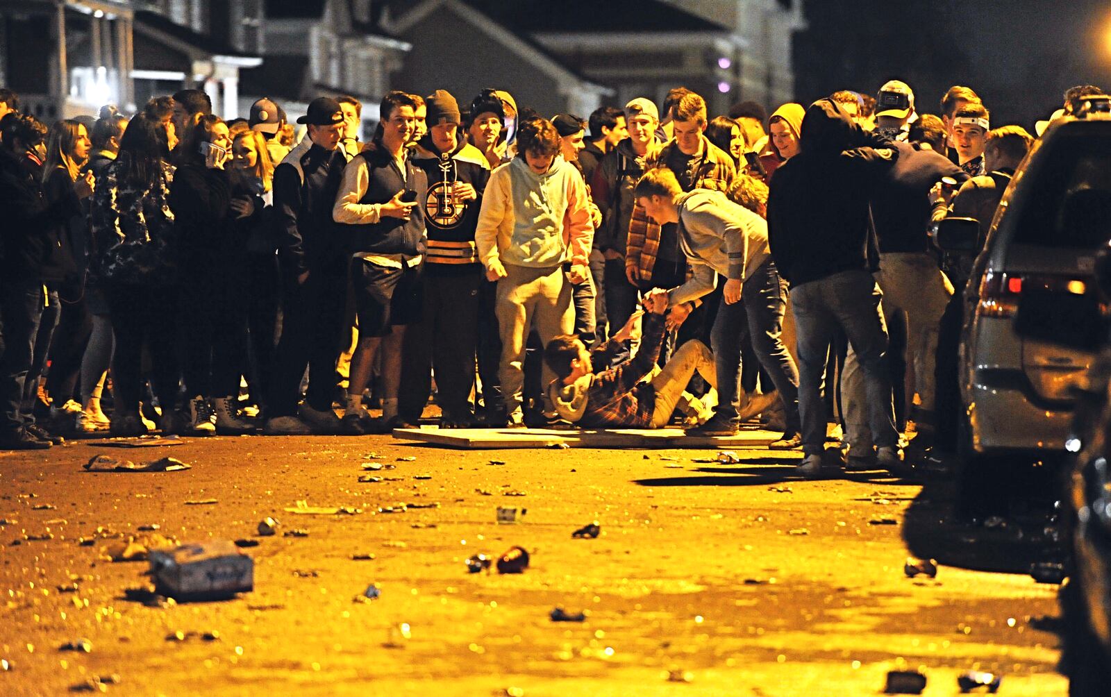 University of Dayton police and city of Dayton police dispersed a large crowd of “disorderly” students in March 2020 during a street party where about 1,000 students gathered. Authorities say students threw bottles and damaged vehicles during the incident. MARSHALL GORBY/ STAFF