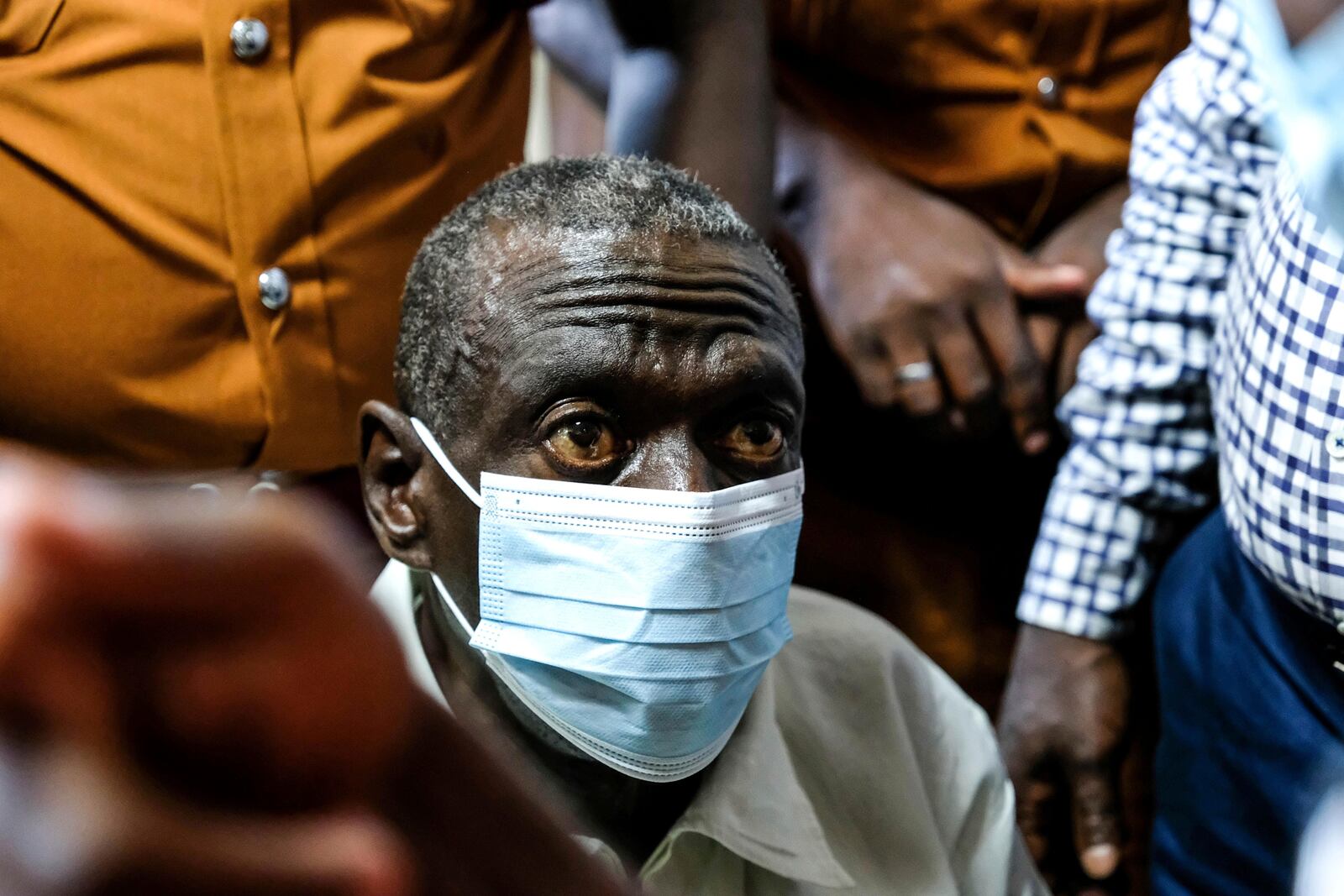 Ugandan opposition leader and four-time presidential candidate Kizza Besigye appears in a civilian court in Kampala, Uganda Wednesday, Feb. 19, 2025. (AP Photo/Hajarah Nalwadda)