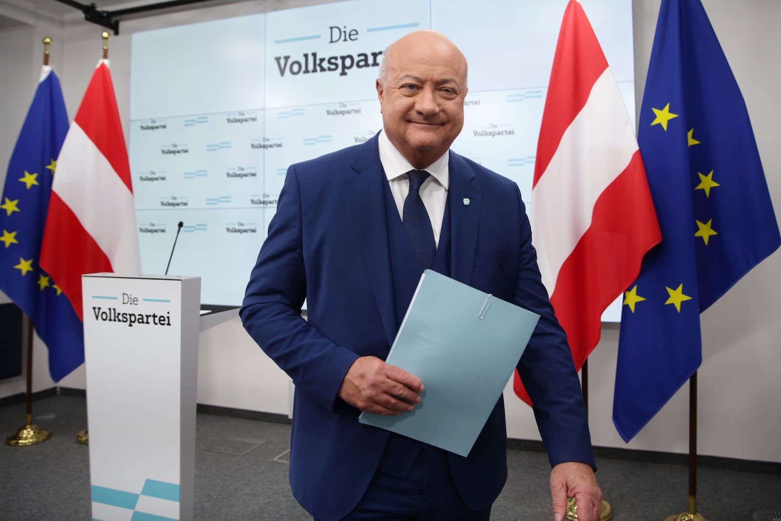 Head of Austrian Peoples' Party (OeVP) Christian Stocker leaves a news conference in Vienna, Austria, Wednesday, Feb 12, 2025. (AP Photo/Heinz-Peter Bader)