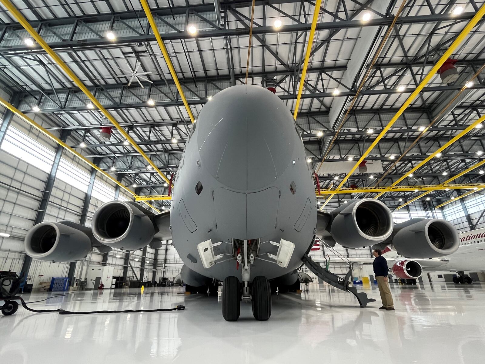 A C-17 military cargo plane inside Sierra Nevada Corp.'s new maintenance, repair and overhaul facility at the Dayton International Airport on Wednesday, Feb. 8, 2023. CORNELIUS FROLIK / STAFF