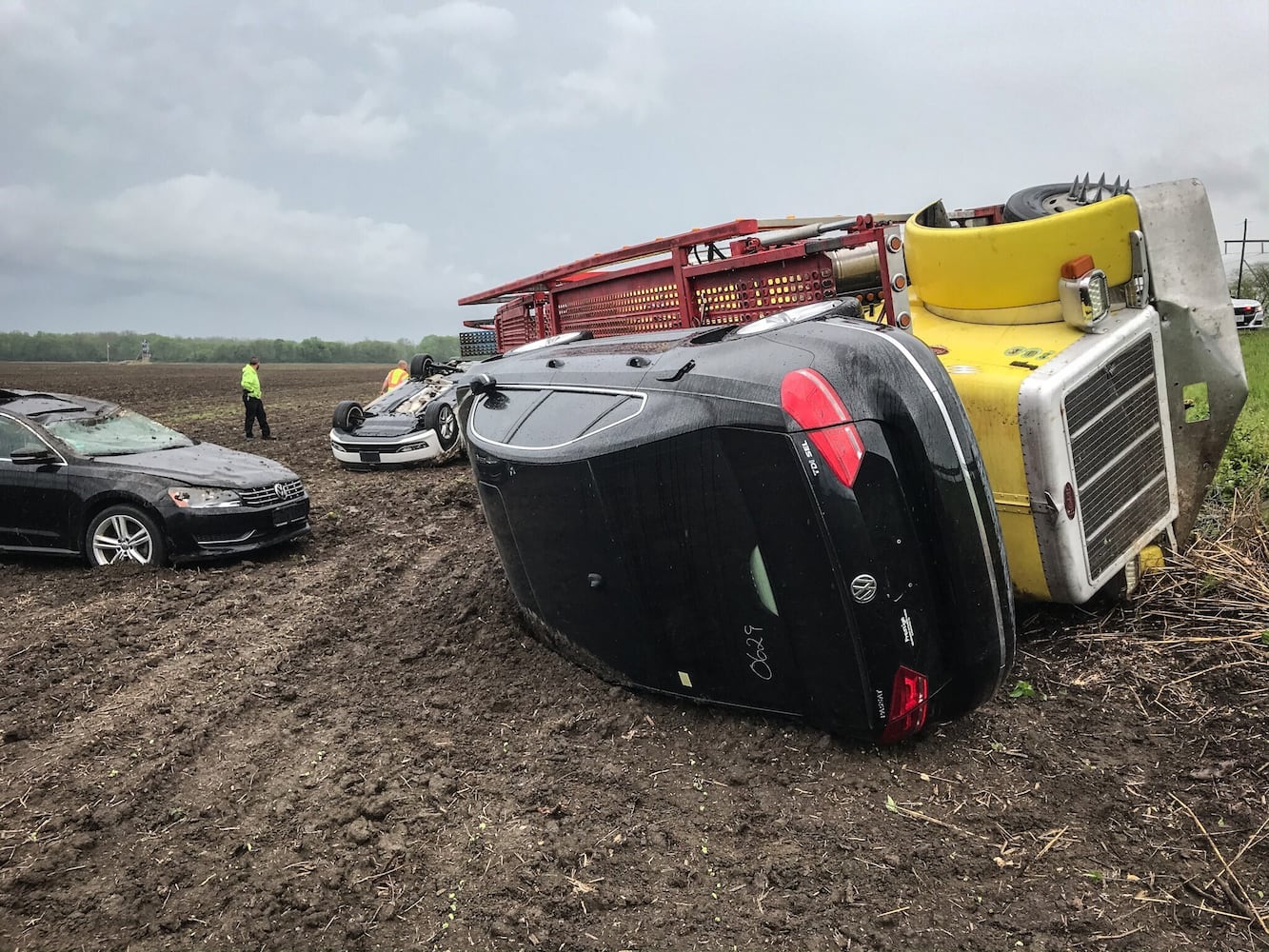 Truck hauling VWs overturns on I-70 West in Clark County