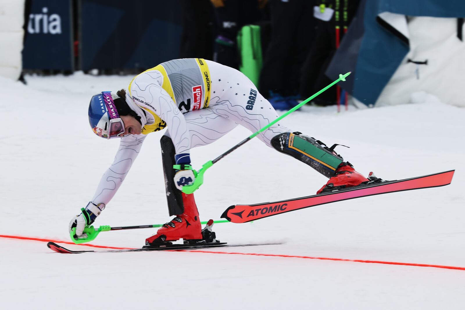 Brazil's Lucas Pinheiro Braathen crosses the finish line of a men's slalom, at the Alpine Ski World Championships, in Saalbach-Hinterglemm, Austria, Sunday, Feb. 16, 2025. (AP Photo/Marco Trovati)