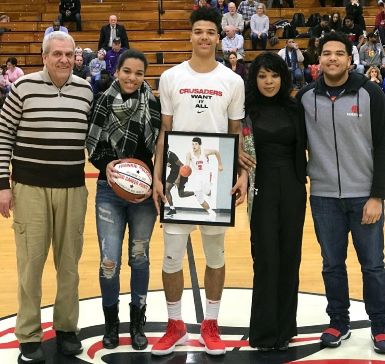 Frankie Policelli, center, poses with his family on Senior Night at Long Island Lutheran (N.Y) in March. Left to right: dad Frank, sister Amber, mom Angie and brother Niko. Submitted photo