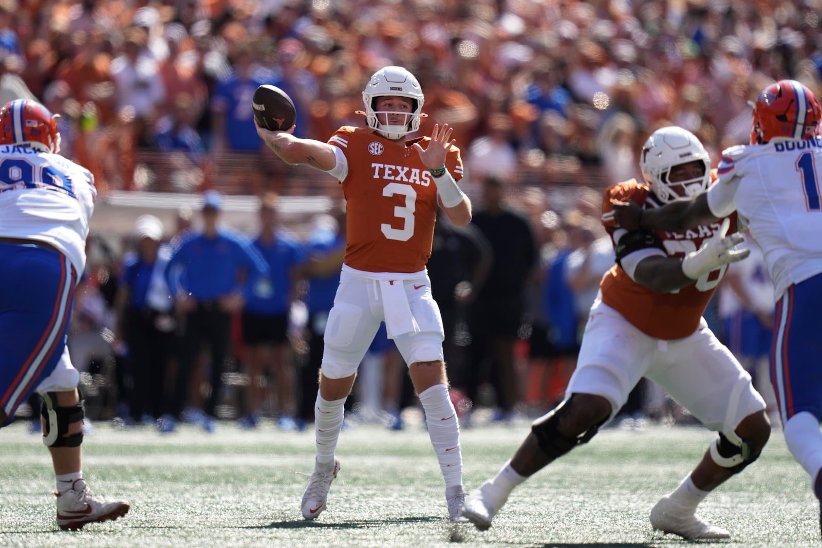 FILE - Texas quarterback Quinn Ewers (3) throws against Florida during the first half of an NCAA college football game in Austin, Texas, Saturday, Nov. 9, 2024. (AP Photo/Eric Gay, File)