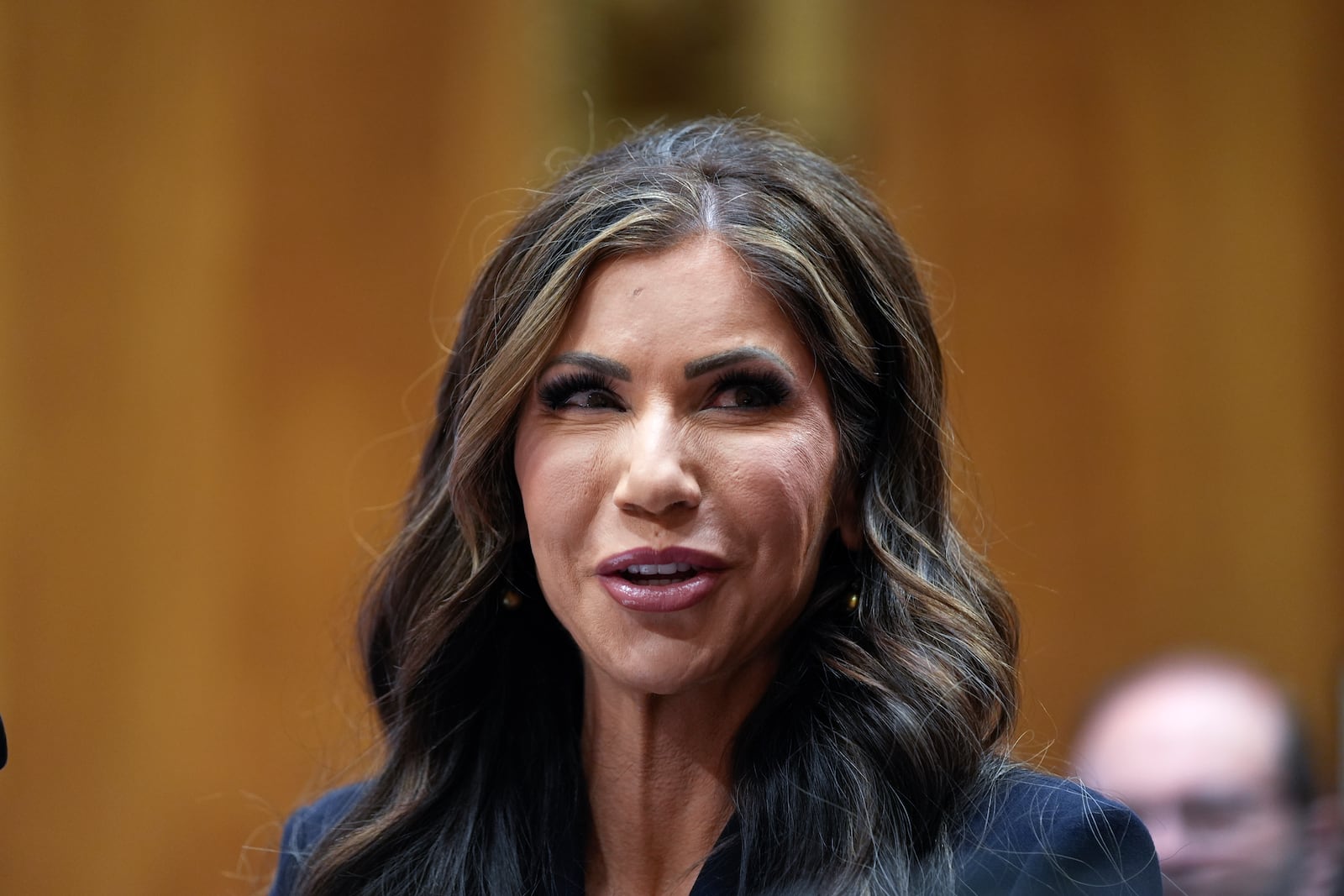 South Dakota Gov. Kristi Noem, President-elect Donald Trump's nominee to be Secretary of Homeland Security, appears before the Senate Homeland Security and Governmental Affairs Committee for her confirmation hearing, at the Capitol in Washington, Friday, Jan. 17, 2025. (AP Photo/Susan Walsh)