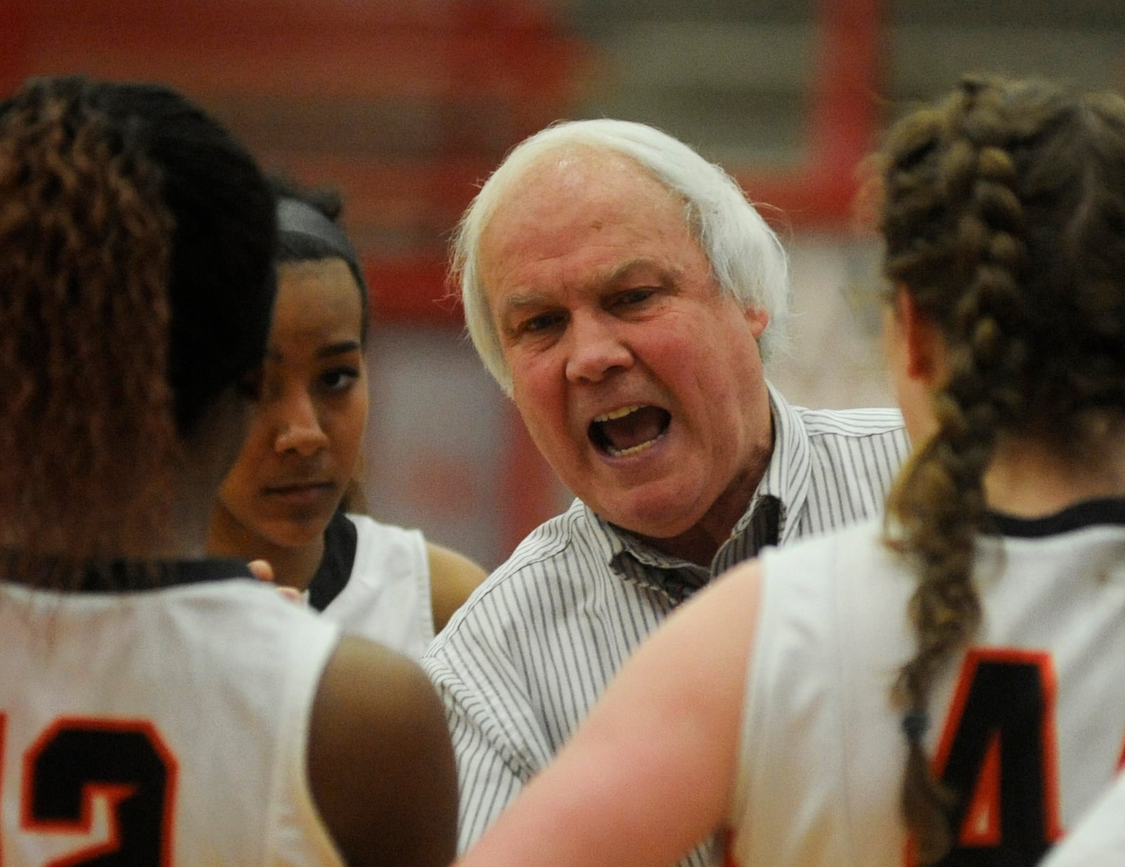 Beavercreek coach Ed Zink talks to his team during last year's Division I sectional final against Tecumseh at Troy on Feb. 19, 2016. MARC PENDLETON/STAFF