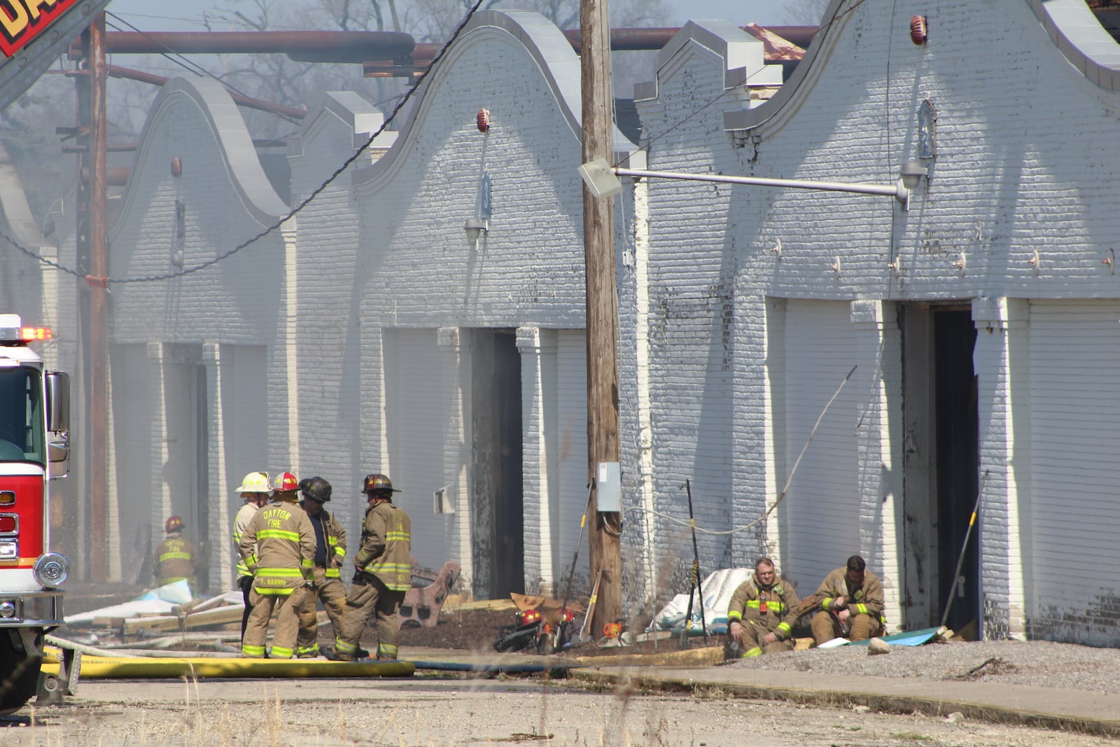 Dayton firefighters at the scene of a fire at the historic Wright brothers factory site in West Dayton on Sunday, March 26, 2023. CORNELIUS FROLIK / STAFF